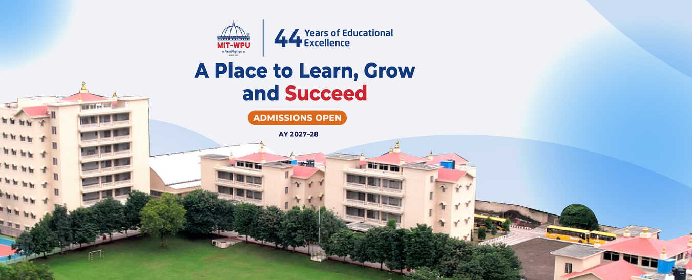 Campus buildings with admissions banner at MIT World Peace School Alandi